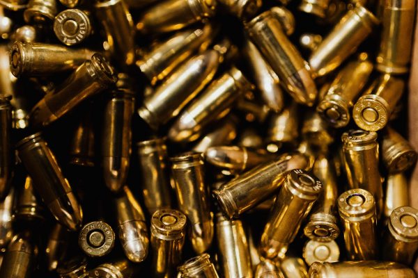 A large number of gold-colored bullets.